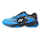 YONEX v 200i Badminton Shoes online at lowest price only on sppartos.com.Blue athletic shoes with black accents on a white background