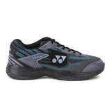 Gray and black athletic shoe with blue accents on a white background